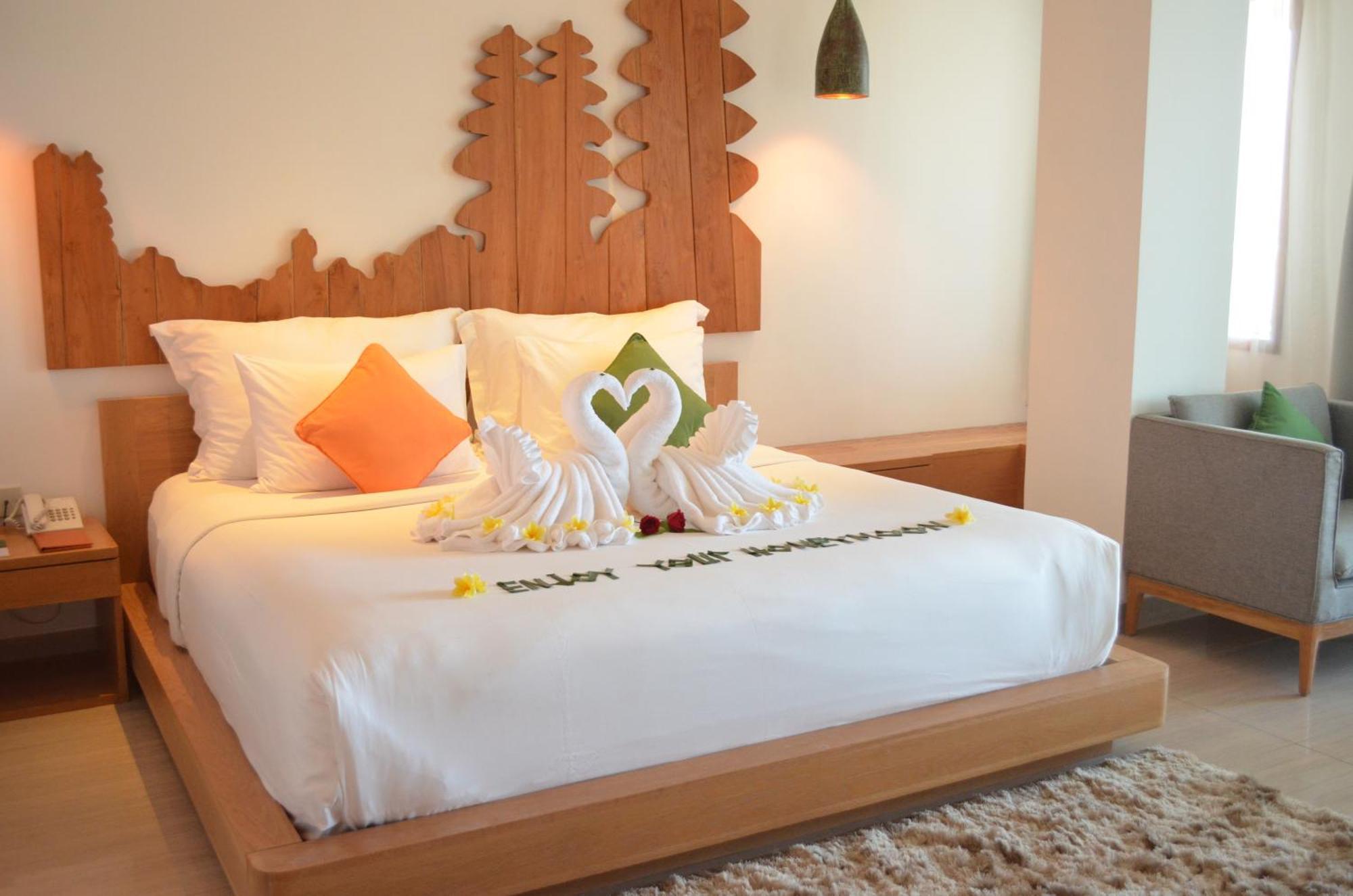 Hotel Nikko Bali Benoa Beach Нуса-Дуа Экстерьер фото A bed with a towel art