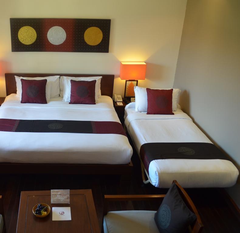 Hotel Nikko Bali Benoa Beach Нуса-Дуа Экстерьер фото A hotel room with a king bed and a single bed